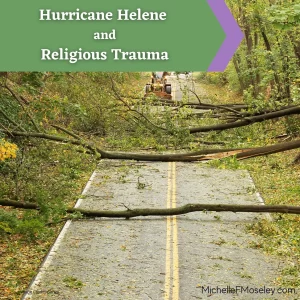 Trees and other debris lying across a two-lane road following high winds from a hurricane.  