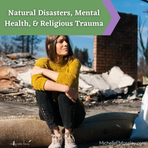 A white woman with brown hair and wearing a yellow sweater and black jeans sits on the ground in front of the rubble of a building destroyed by natural disaster.